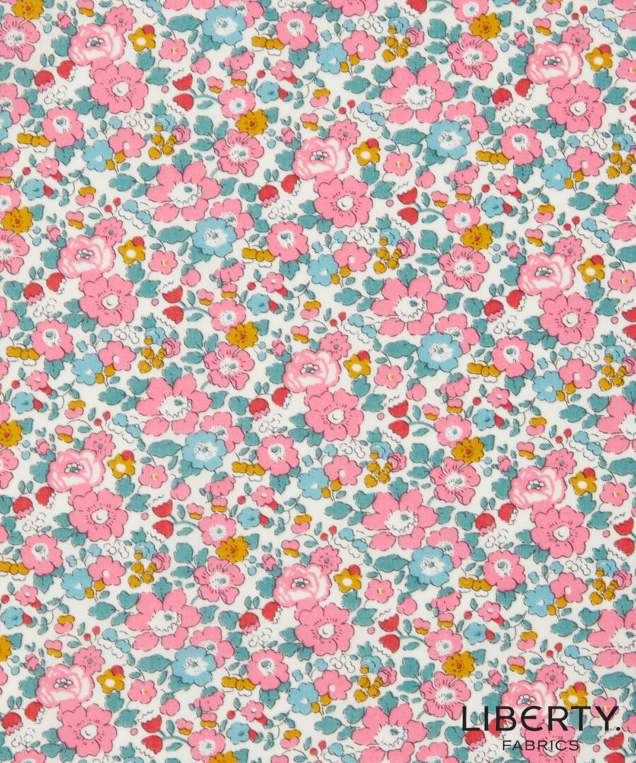 A pink and blue floral pattern on fabric.